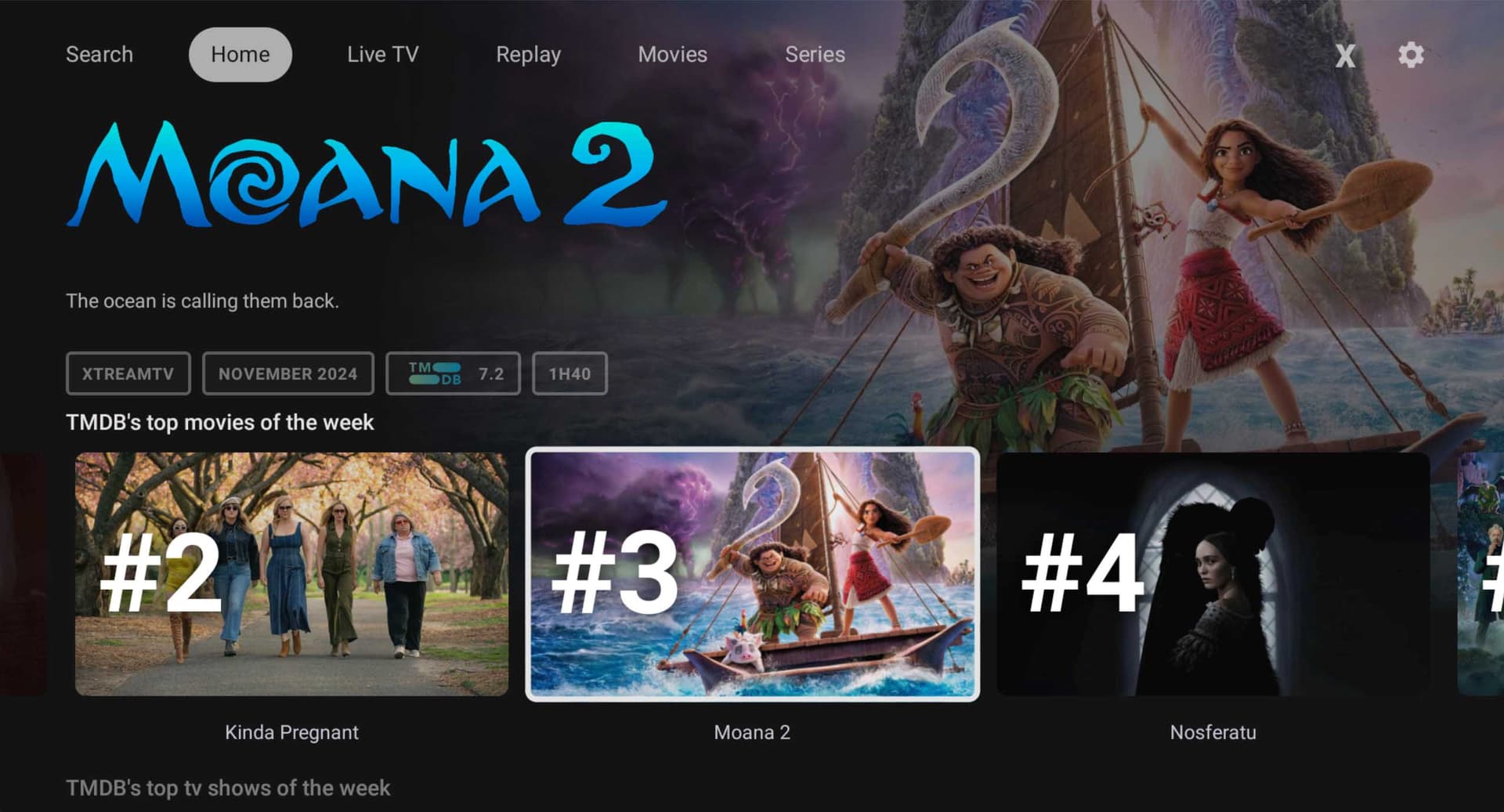 IPTV streaming app home screen featuring Moana 2 with navigation menu for Search, Home, Live TV, Replay, Movies, and Series with top rated content